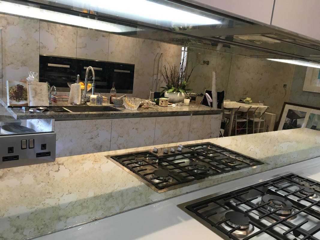 Mirror glass splashback in Ladbroke Grove luxury kitchen